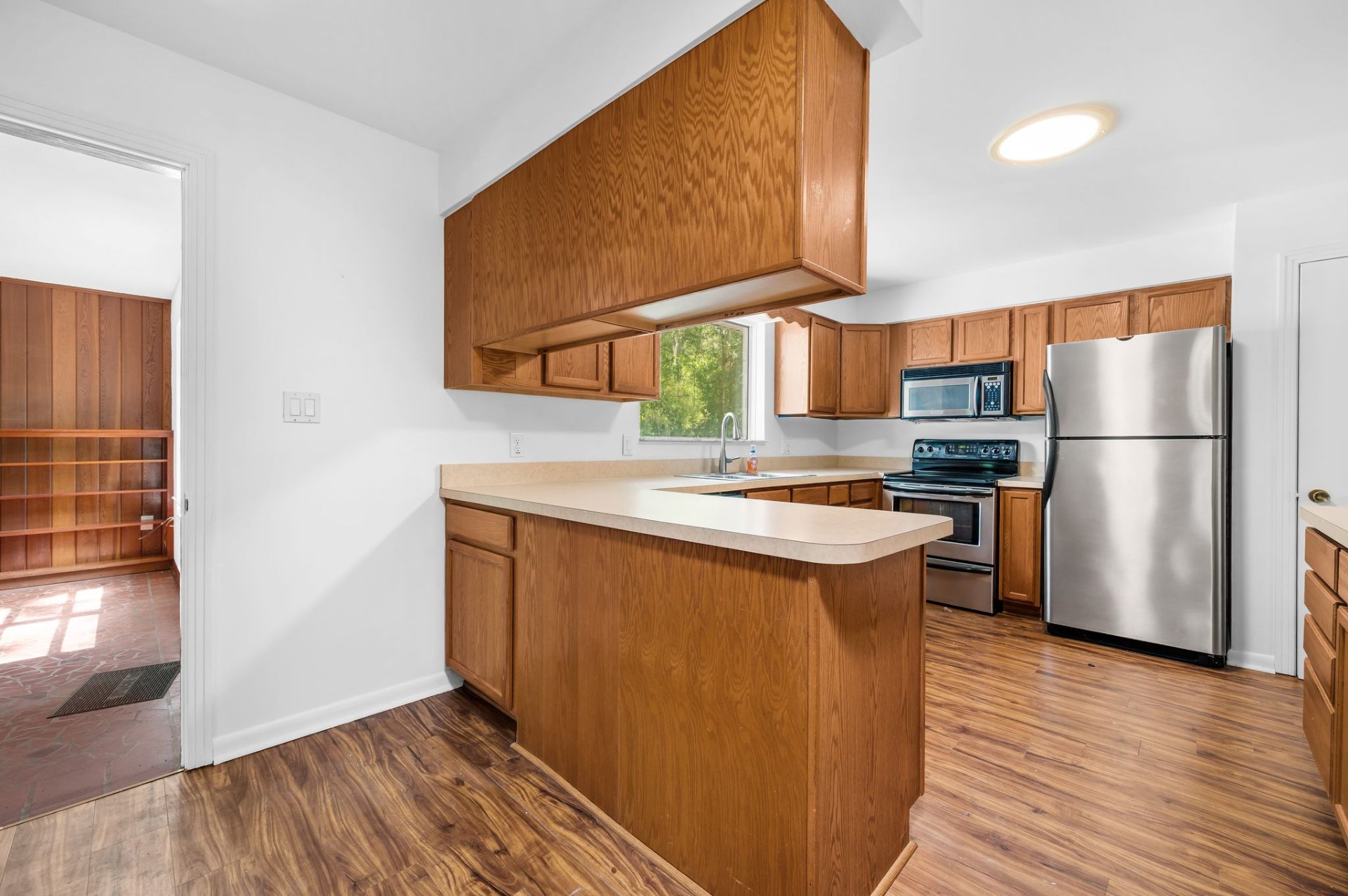 Kitchen opens to the Florida room
